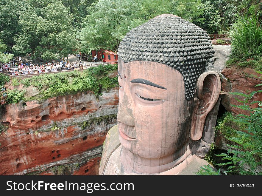 Grand Buddha statue in Leshan, China. It was finished in the year 803, and is in total 71 meters high.