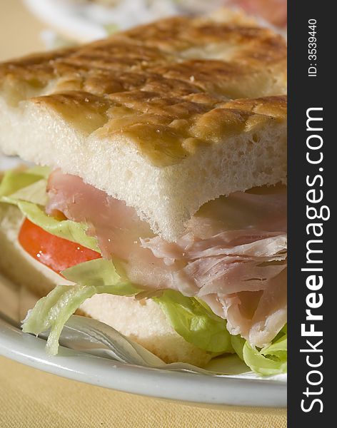 Close up ham and vegetable sandwich with lettuce. Close up ham and vegetable sandwich with lettuce