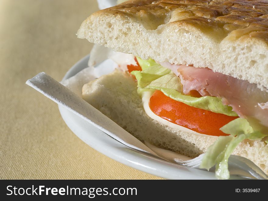 Close up ham and vegetable sandwich with lettuce. Close up ham and vegetable sandwich with lettuce