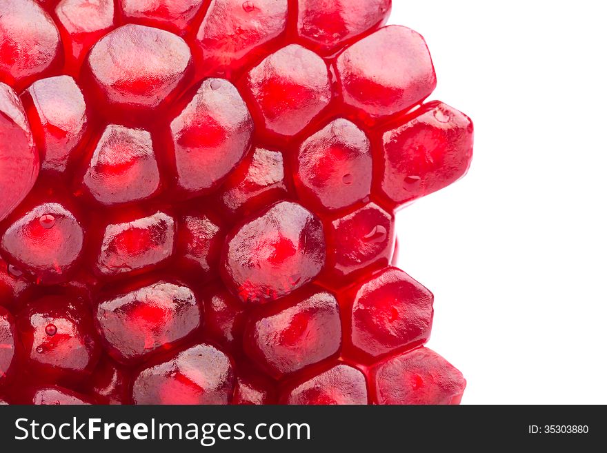 Pomegranate with its seeds close-up. Pomegranate with its seeds close-up