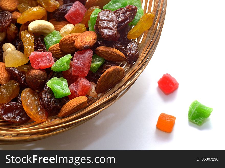 Nut mix and dried fruit in a wicker basket