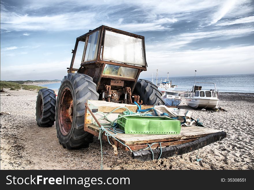 Tractor boat on the beach