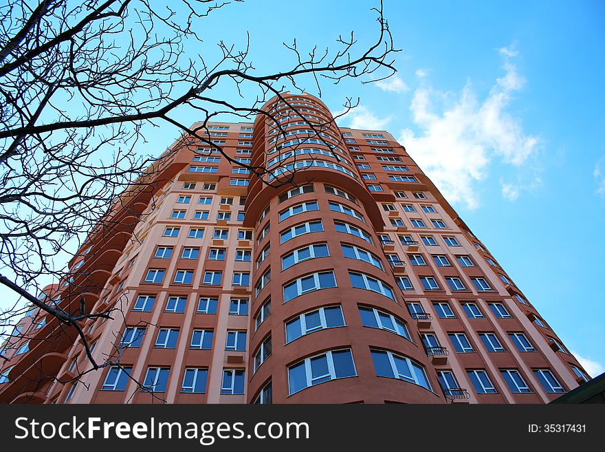 A photo of Part of new modern high rise apartment building facade