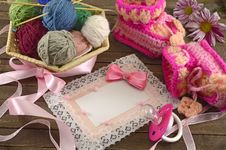 Pink Greeting Card With Baby Knitting Things Royalty Free Stock Image