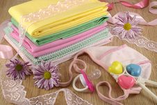 Baby Linen And Hat With Playthings Royalty Free Stock Photo Baby Linen And Hat With Playthings Royalty Free Stock Photo