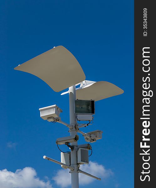 CCTV , Speaker and Sport Light with blue sky background