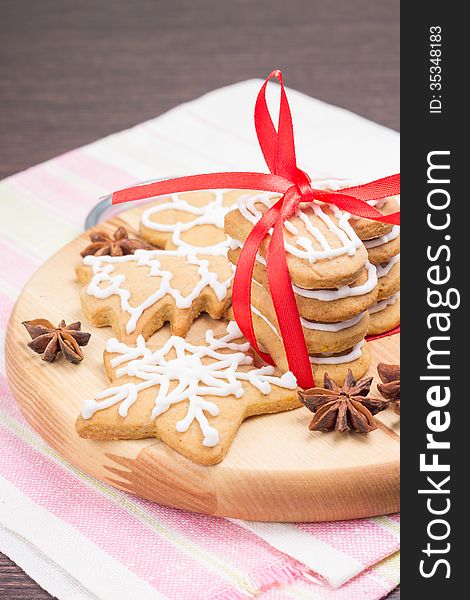 Christmas Gingerbread cookies on wooden board