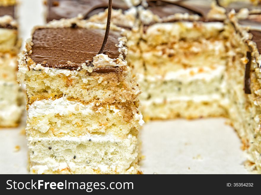 Tasty puff pastries. Chocolate and layer cake. Tasty puff pastries. Chocolate and layer cake