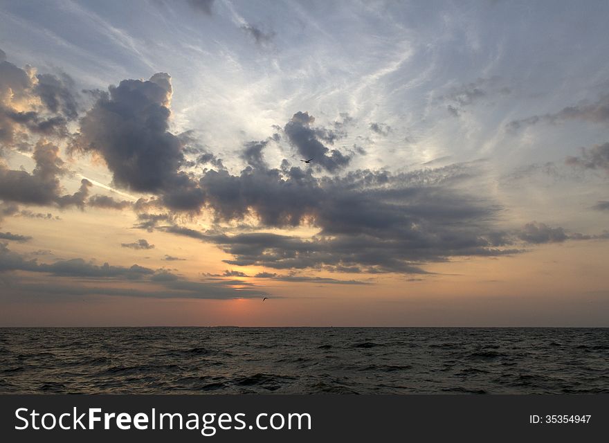 A sunset shot stiched from two shots. Clouds and light were beautiful. A sunset shot stiched from two shots. Clouds and light were beautiful.