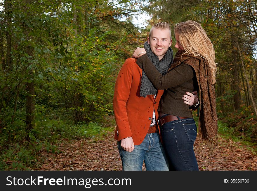 Happy young couple is having a nice time in october. Happy young couple is having a nice time in october