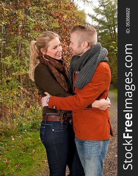 Happy young couple is having a nice time in october. Happy young couple is having a nice time in october
