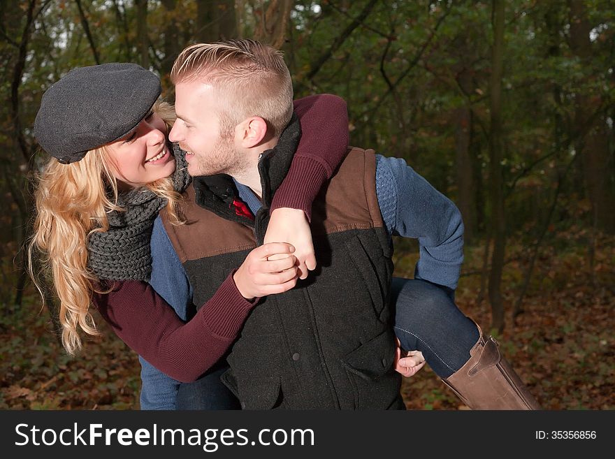 Happy young couple is having a nice time in october. Happy young couple is having a nice time in october