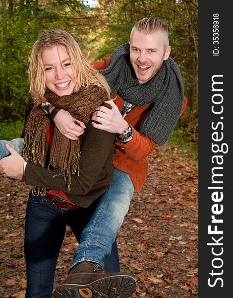 Happy young couple is having a nice time in october. Happy young couple is having a nice time in october