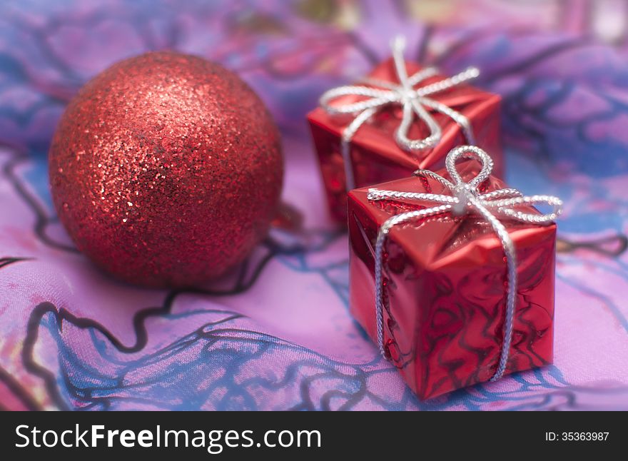 Christmas gifts on the color background