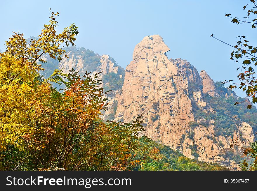 The steep peak and autumnal scenery