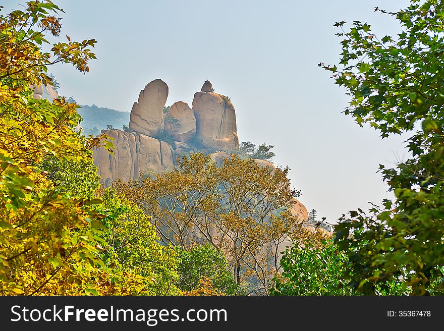 The Overlooking Sea Boulders And Autumnal Scenery