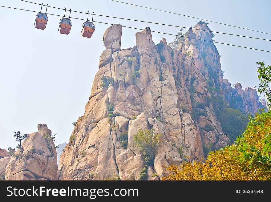 The Cliff Peak And Cable Car Autumnal Scenery