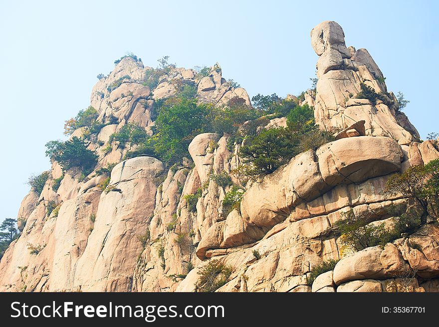 The stone mountain and autumnal scenery