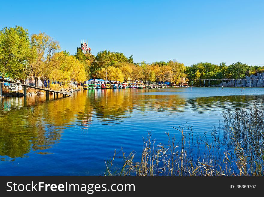 The Blue Lake Water And Pavilion Autumnal Scenery