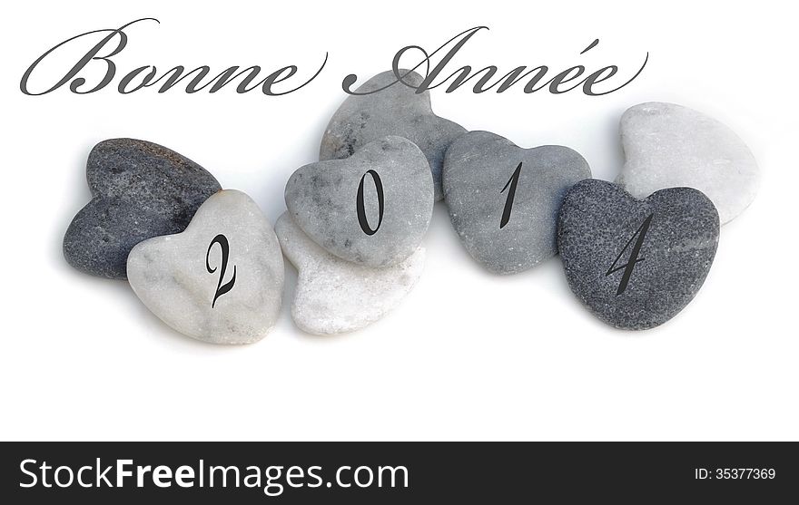 Happy new year for 2014 (in french) with four stone hearts on white background. Happy new year for 2014 (in french) with four stone hearts on white background