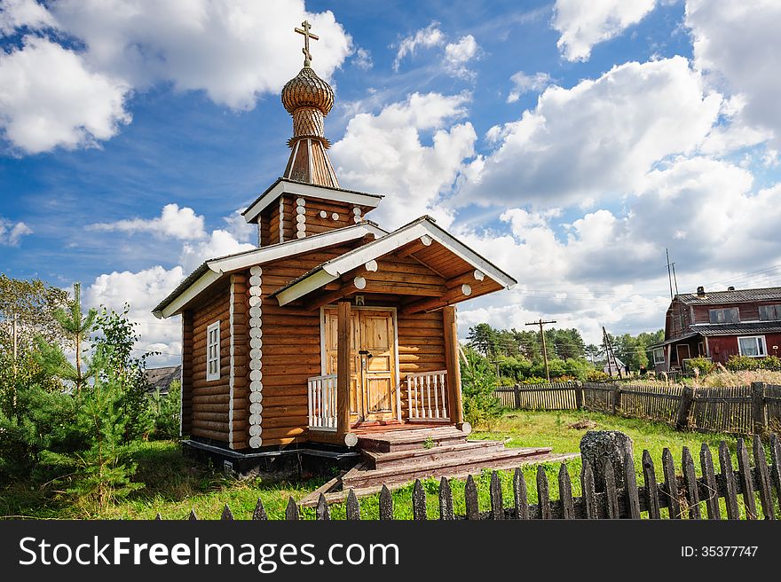 Small wooden Orthodox church in the Kindasovo village, Karelia, north of Russia. Small wooden Orthodox church in the Kindasovo village, Karelia, north of Russia