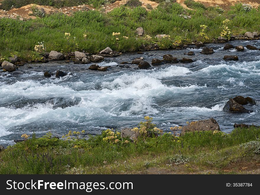 River with rapids near the falls of Gullfoss in Iceland. River with rapids near the falls of Gullfoss in Iceland