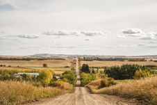 A Gravel Road Through Hilly Countryside Royalty Free Stock Photography A Gravel Road Through Hilly Countryside Royalty Free Stock Photography