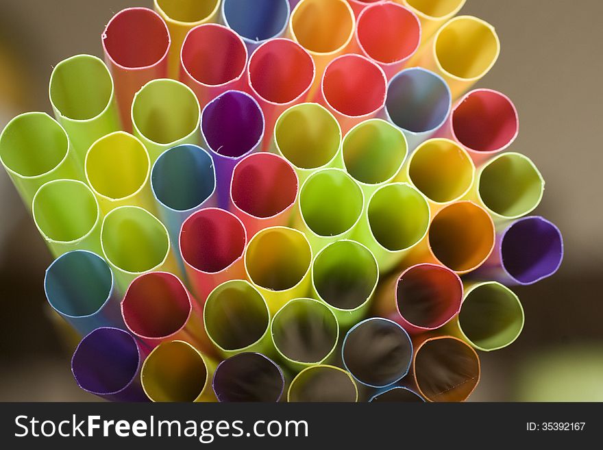 Abstract of colorful straws on a black background