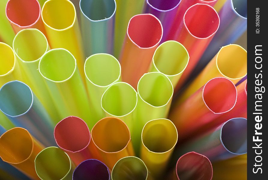 Abstract of colorful straws on a black background