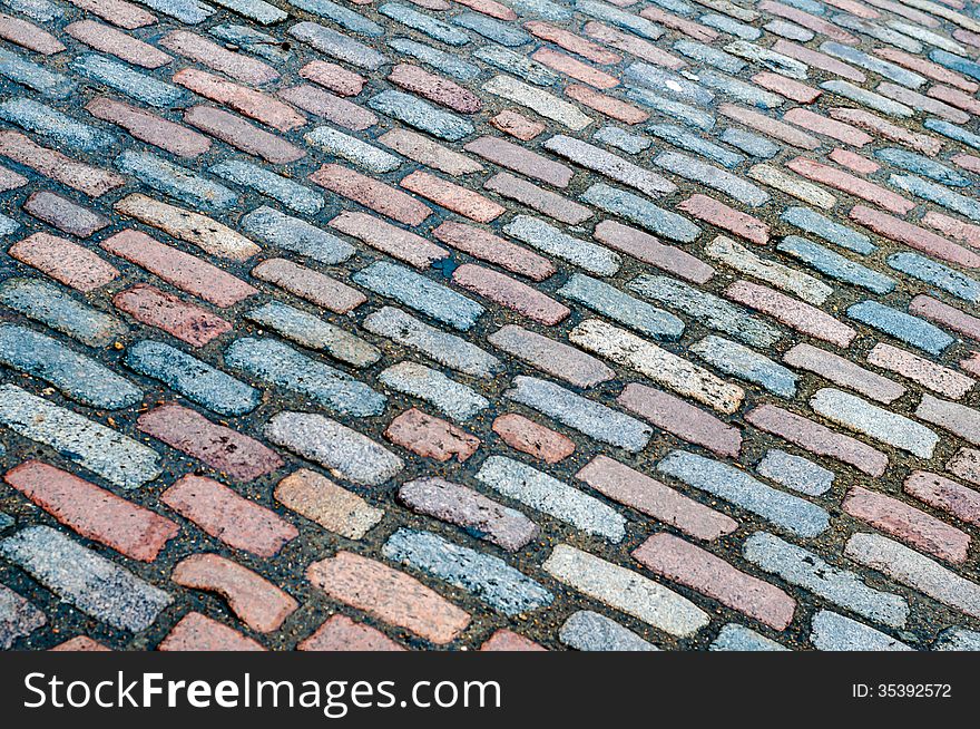 Street Cobbles in Colourful Diagonal Pattern. Street Cobbles in Colourful Diagonal Pattern