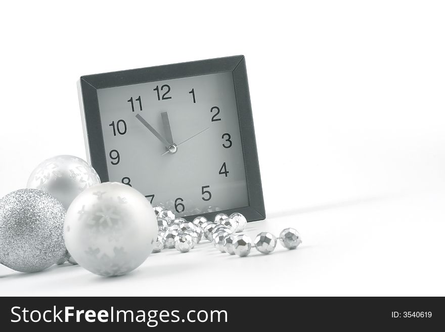Christmas ball and clock on the white background. Christmas ball and clock on the white background.