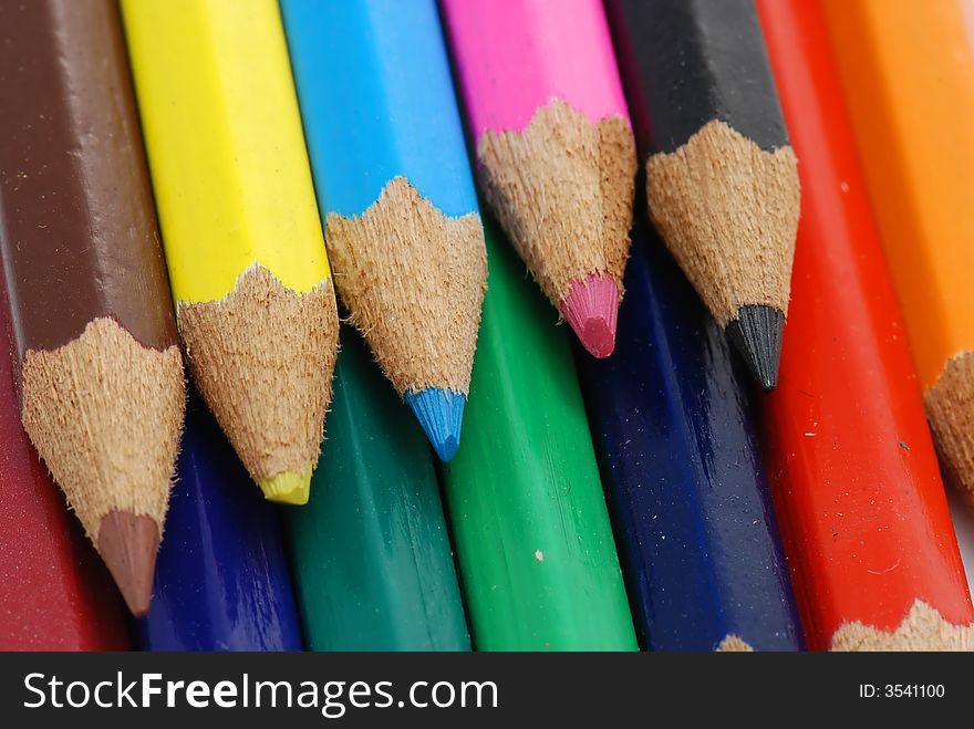 A stack of colored pencils in closeup