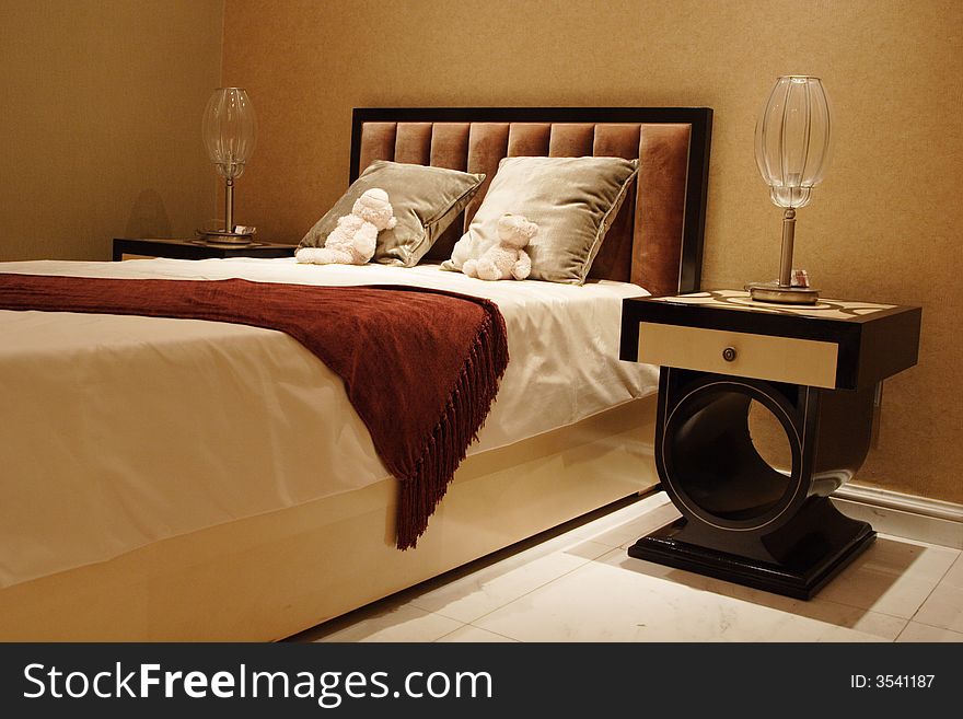 Double bed with bedstand and reading lamp. Double bed with bedstand and reading lamp