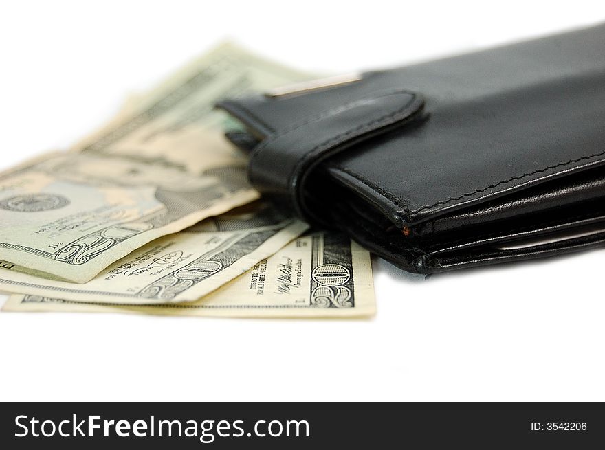 Black leather wallet with some twenty's bank notes. Black leather wallet with some twenty's bank notes