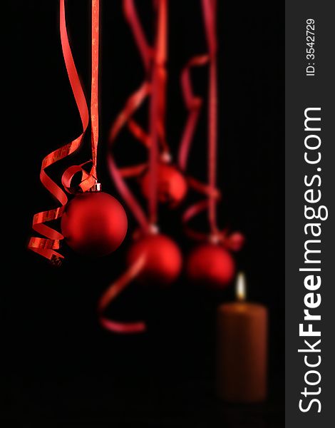 Red balls on black background - Christmas decoration