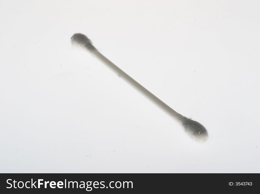 Sticks with cotton applicators for a make-up on a white background. Sticks with cotton applicators for a make-up on a white background