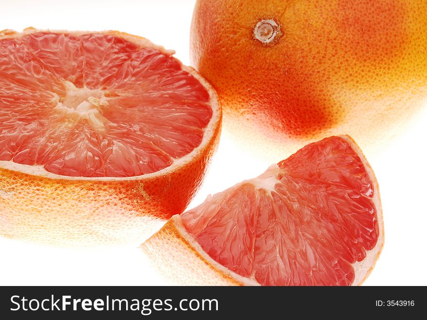 Divided red grapefruit on light box