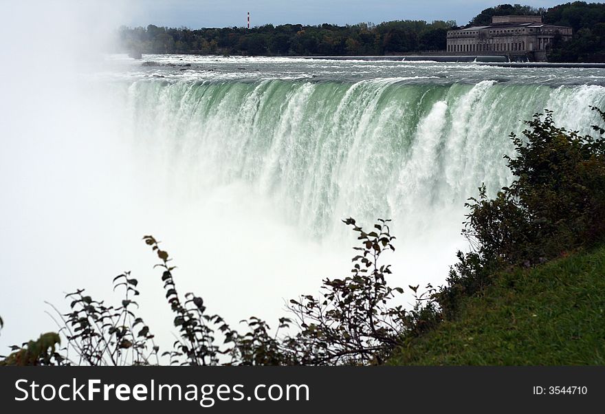 The Niagara Falls taken on a cloudy day.