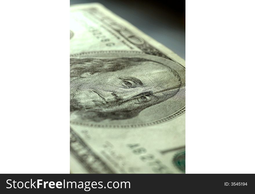 One hundred dollar bill,
United States paper currency. One hundred dollar bill,
United States paper currency