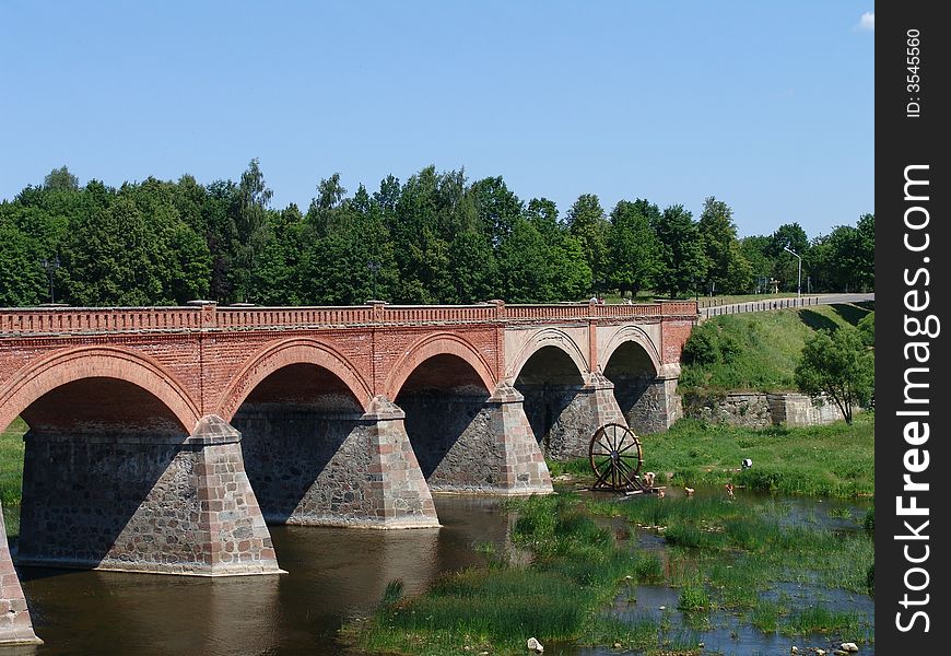 Old stone bridge with columns. Old stone bridge with columns