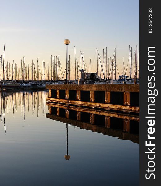Sunset in a harbour at Zeeland,the Netherlands,Europe. Sunset in a harbour at Zeeland,the Netherlands,Europe