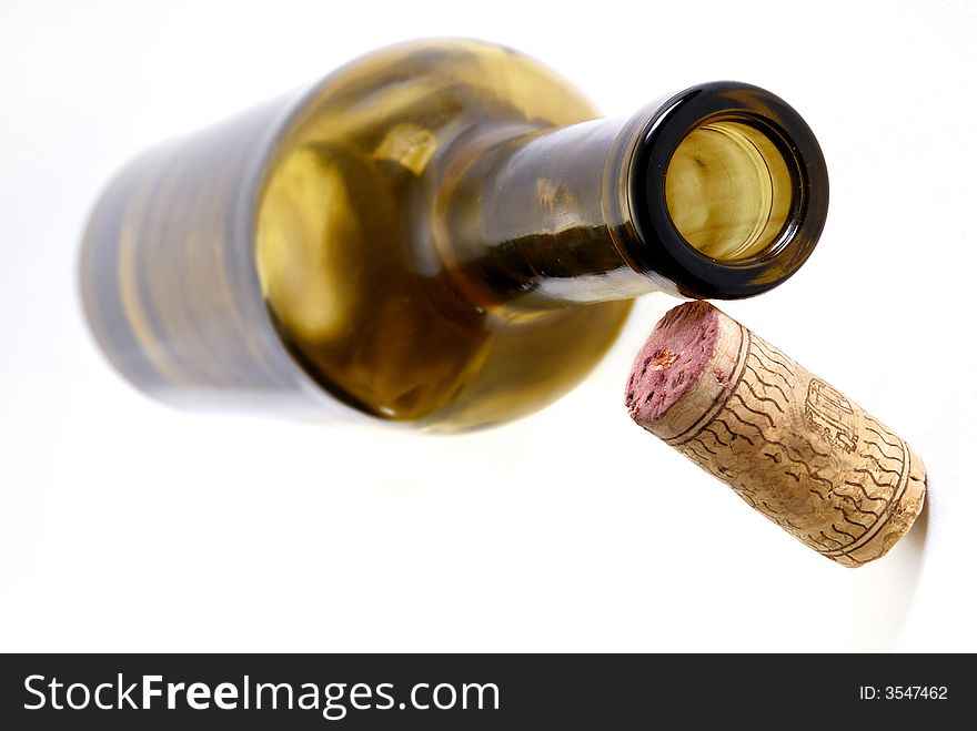 Floating vine bottle in front of a white backbround. Floating vine bottle in front of a white backbround.