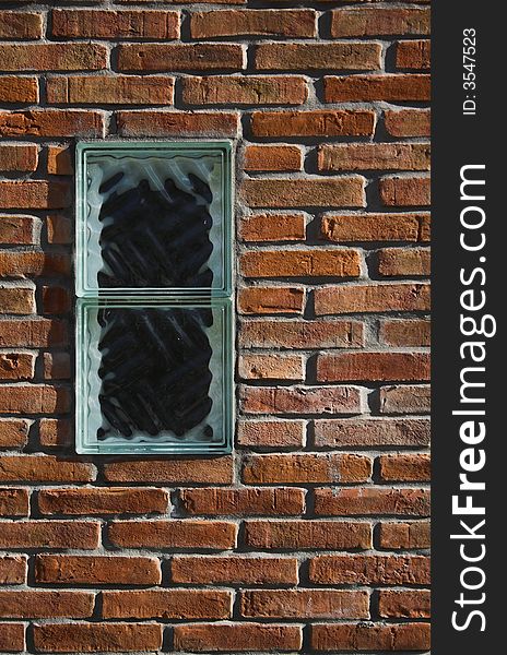 A single window in a brick wall