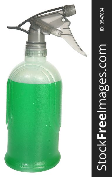 Clear spray bottle filled with green liquid over white. Clear spray bottle filled with green liquid over white.