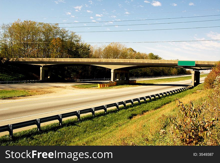 Bridge over the freeway in fall. Bridge over the freeway in fall.