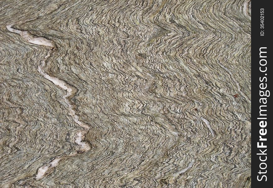 Wavy patterns on a rock. Interesting for background purposes. Wavy patterns on a rock. Interesting for background purposes