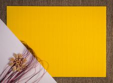 Background For Christmas Greeting Card- Holiday Straw Decoration, Red And Yellow Color Textured Paper Royalty Free Stock Photography Background For Christmas Greeting Card- Holiday Straw Decoration, Red And Yellow Color Textured Paper Royalty Free Stock Photography