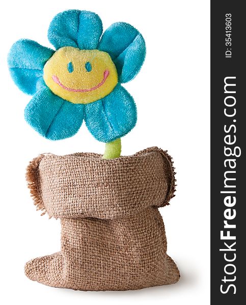 Plush flower in sack on white background