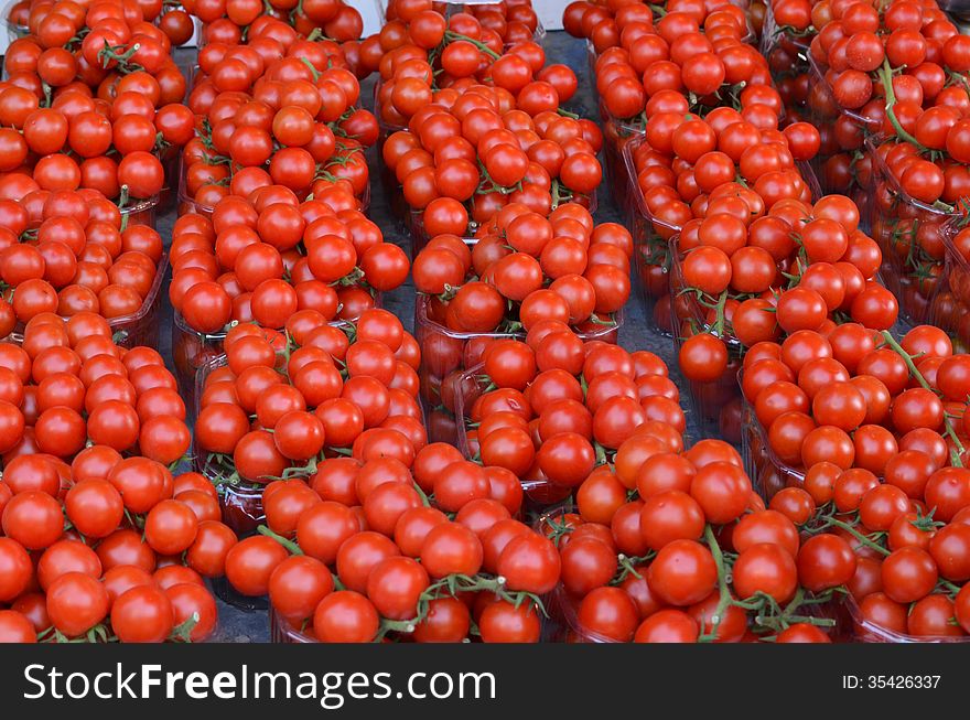 Market stand of cherry tomatoes