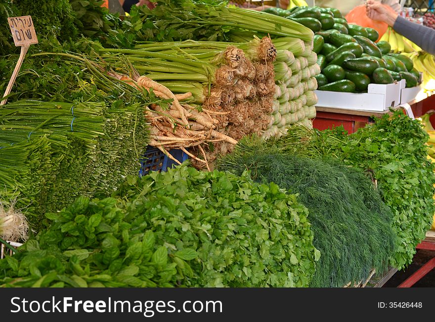 Market stand of green vegetables